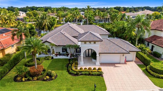 $1,625,000 | 615 Enclave Circle West | Grand Palms