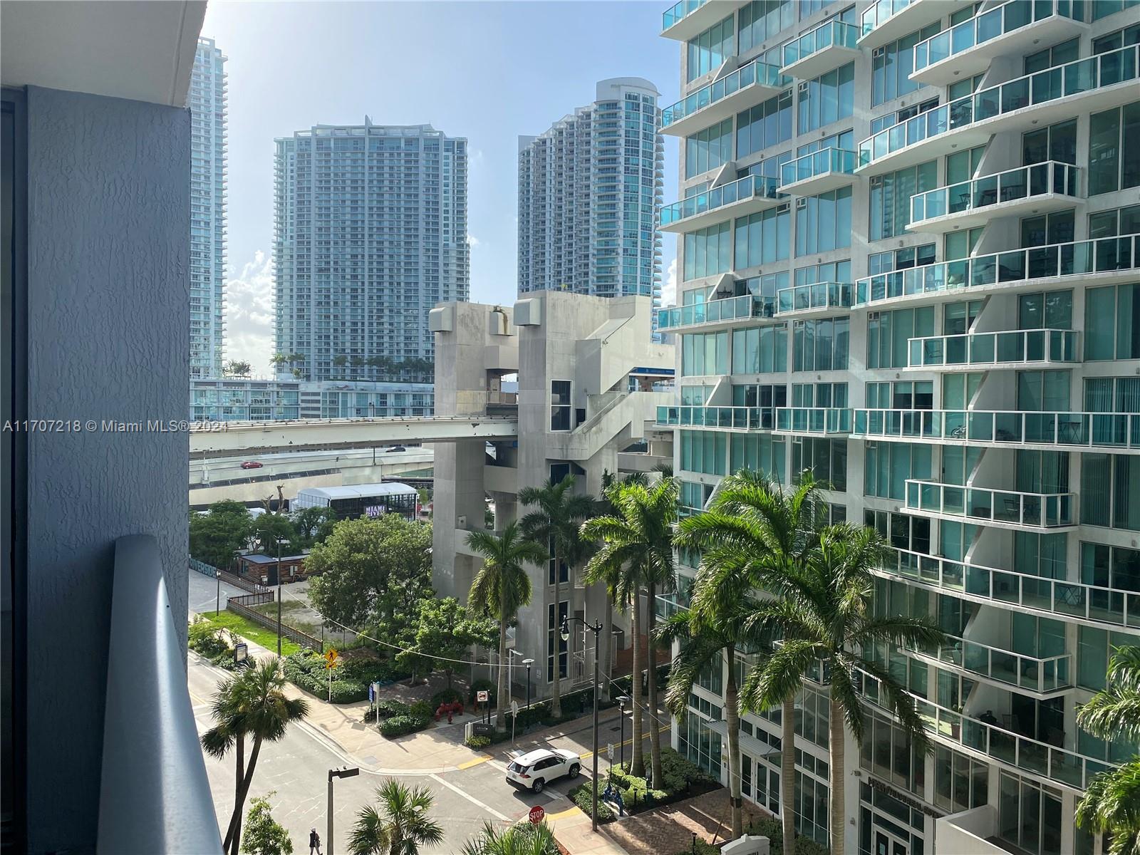 a view of a city with tall buildings