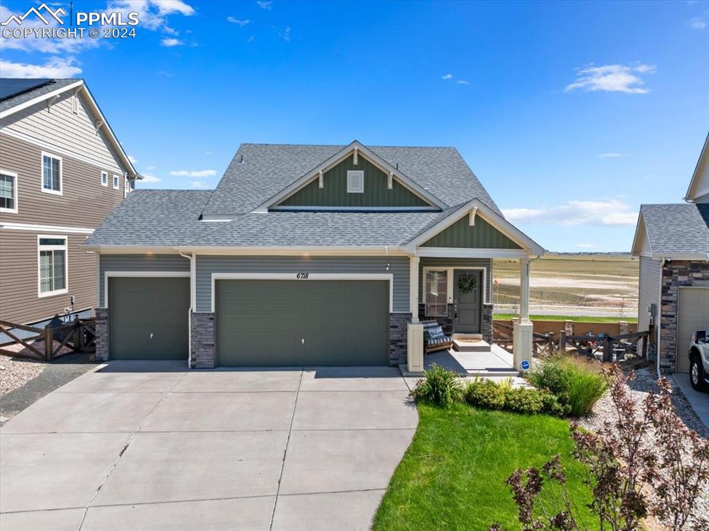 View of front of home with a garage