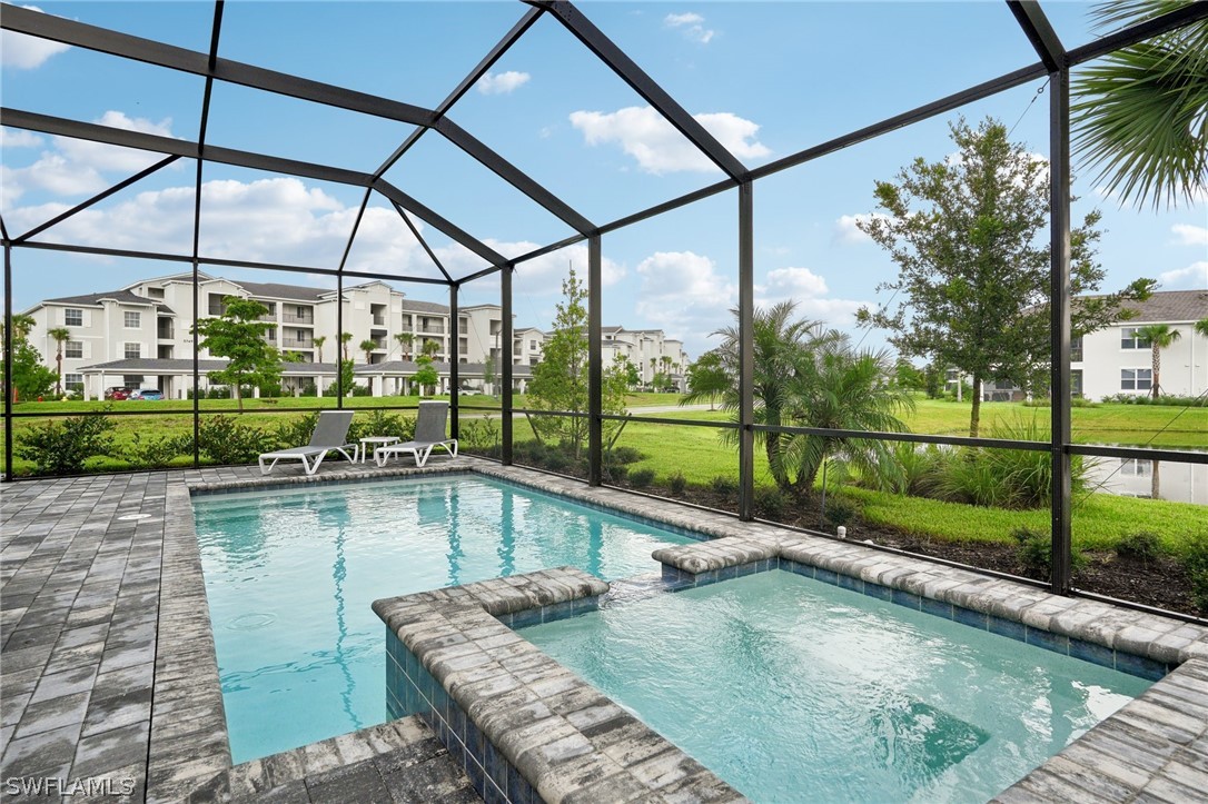 a view of swimming pool from a balcony