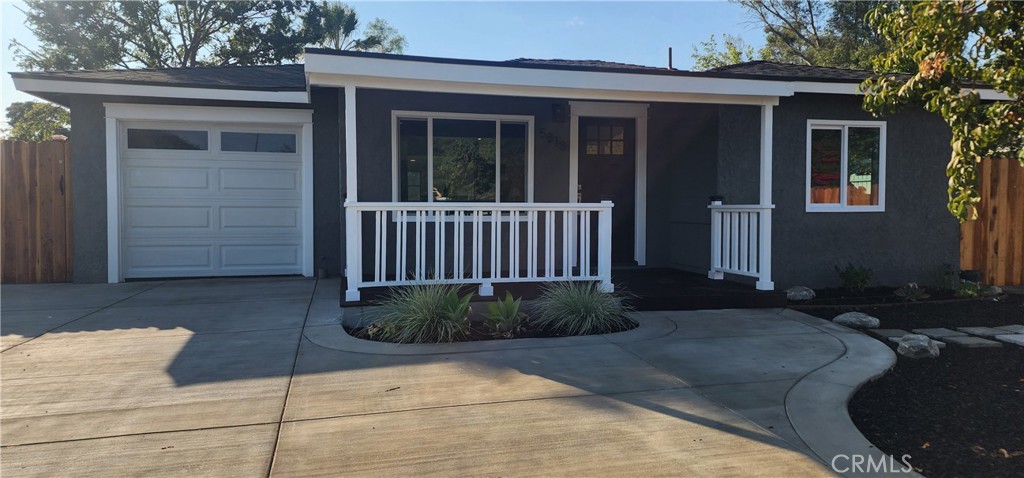 a view of backyard with porch