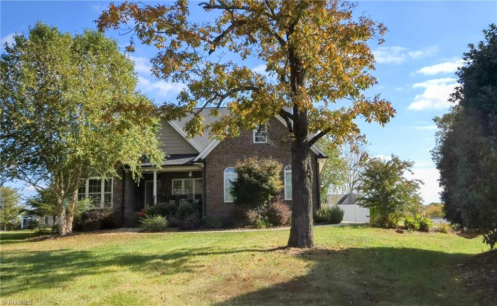 GORGEOUS HOME on .50 acre lot with side entry garage