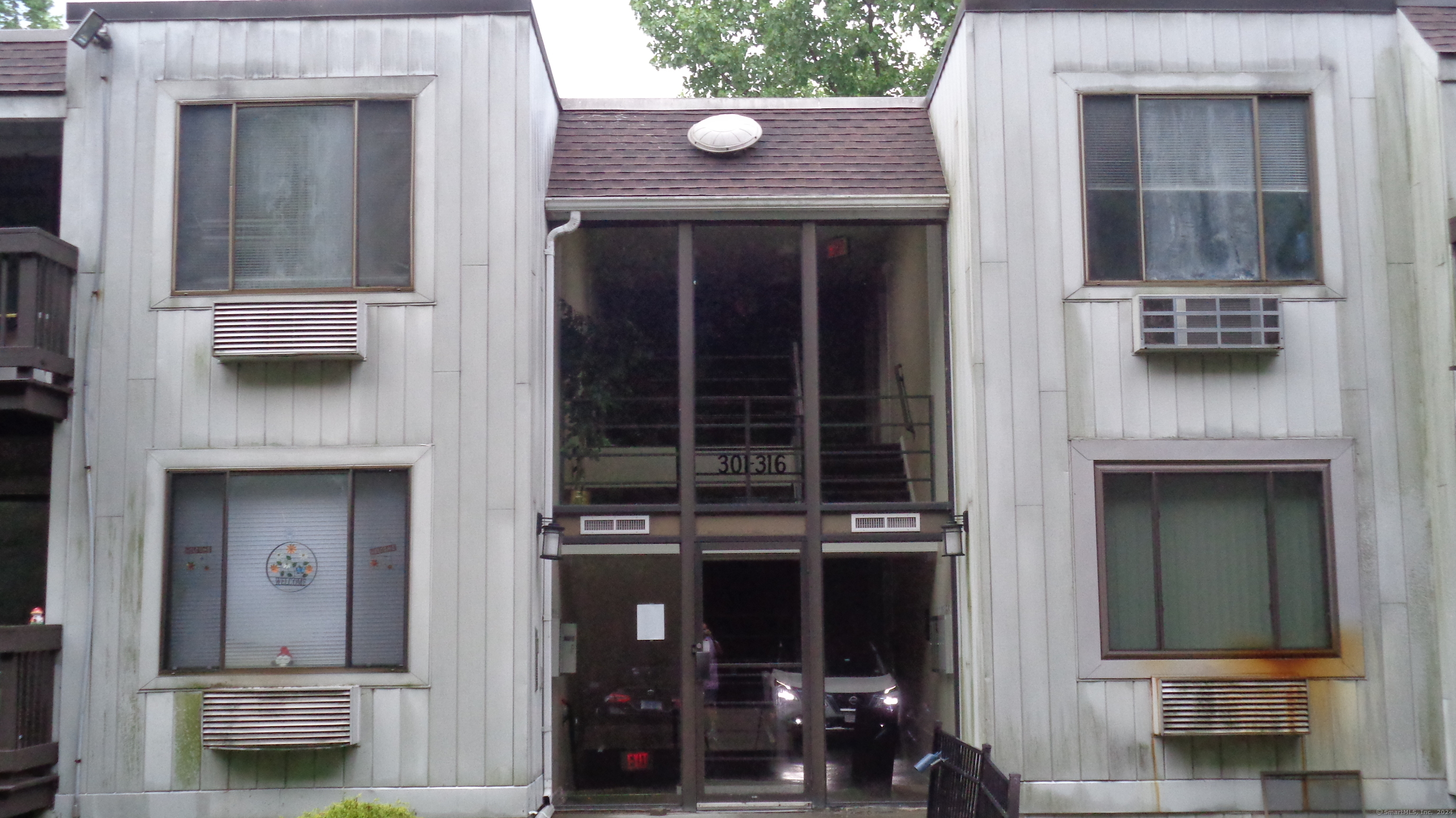 a view of house with front door