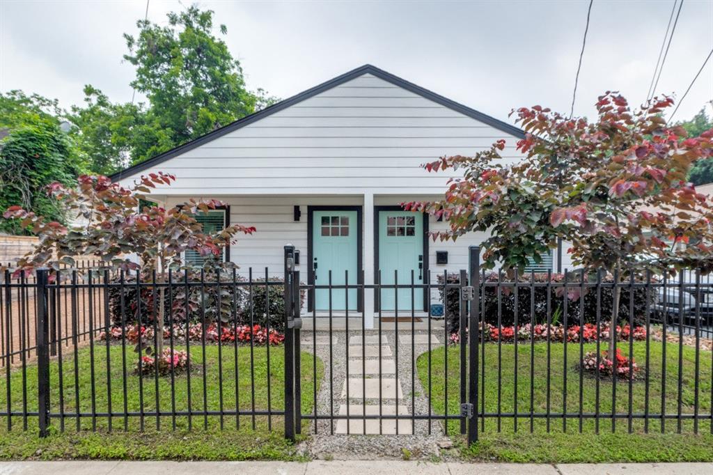 a front view of a house having yard