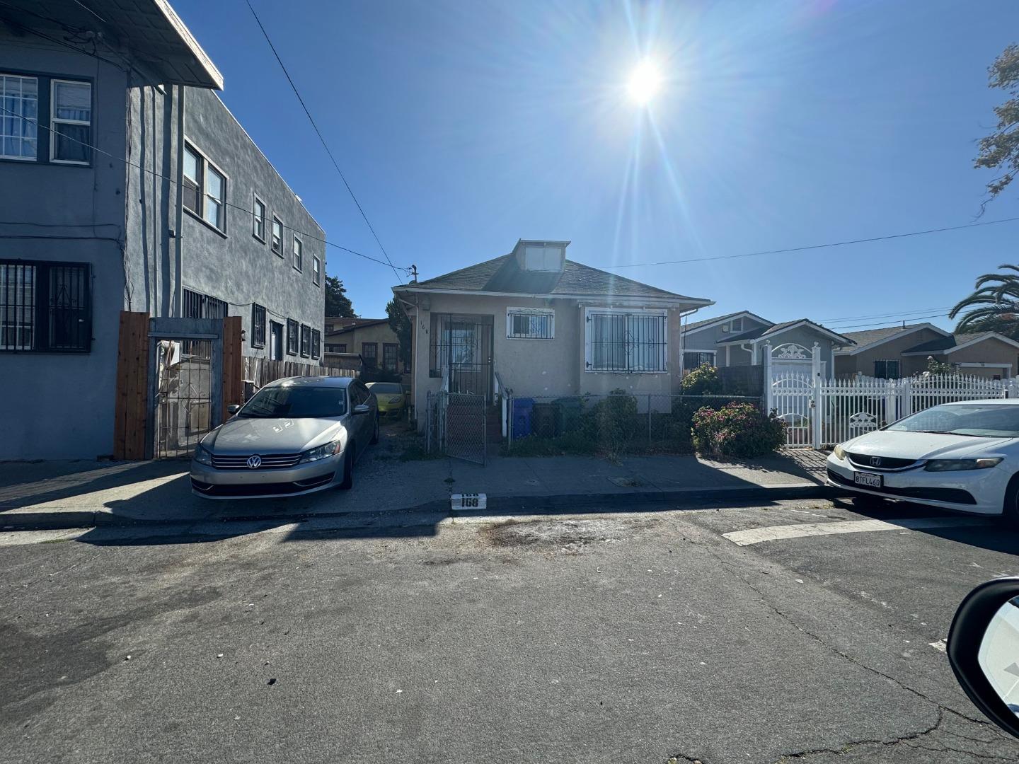 a view of a street with cars