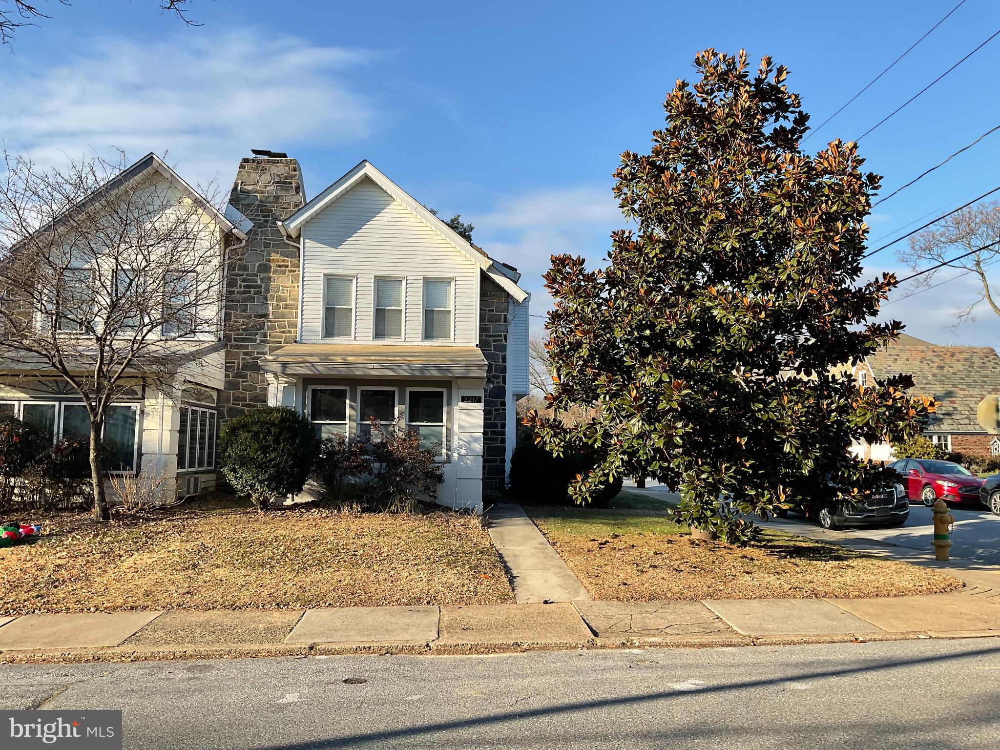 a front view of house with yard