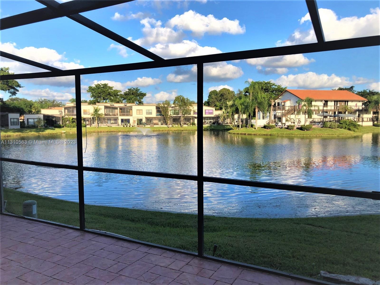 a view of swimming pool from a window