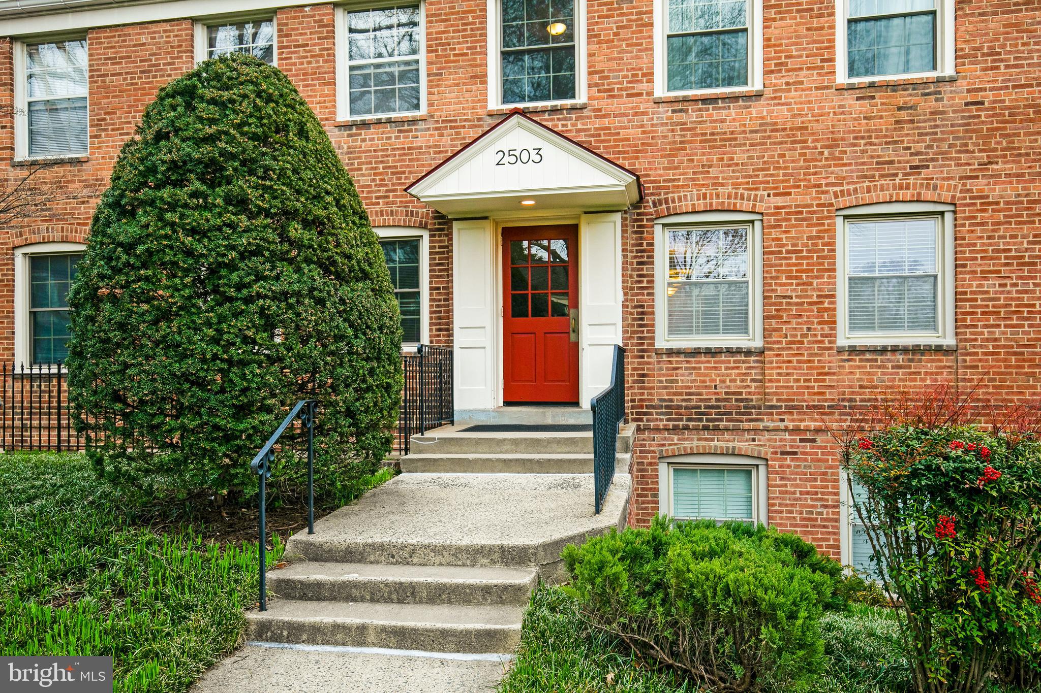 a front view of a house having yard