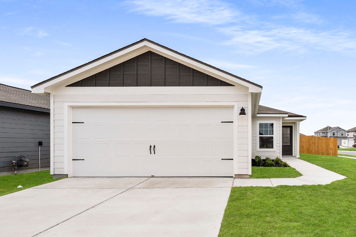 a front view of house with yard