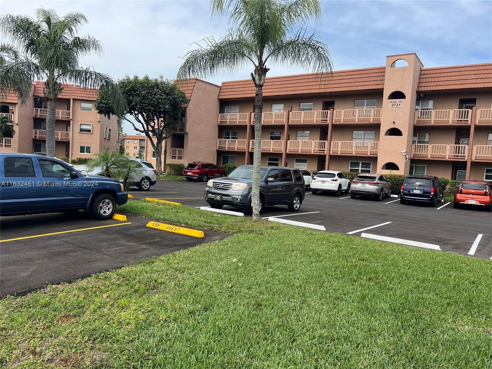 a cars parked in front of a house