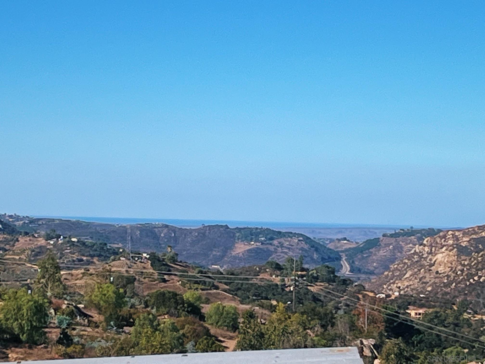 an aerial view of mountain and tree