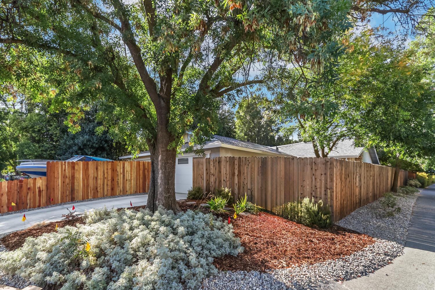 a backyard of a house with lots of green space