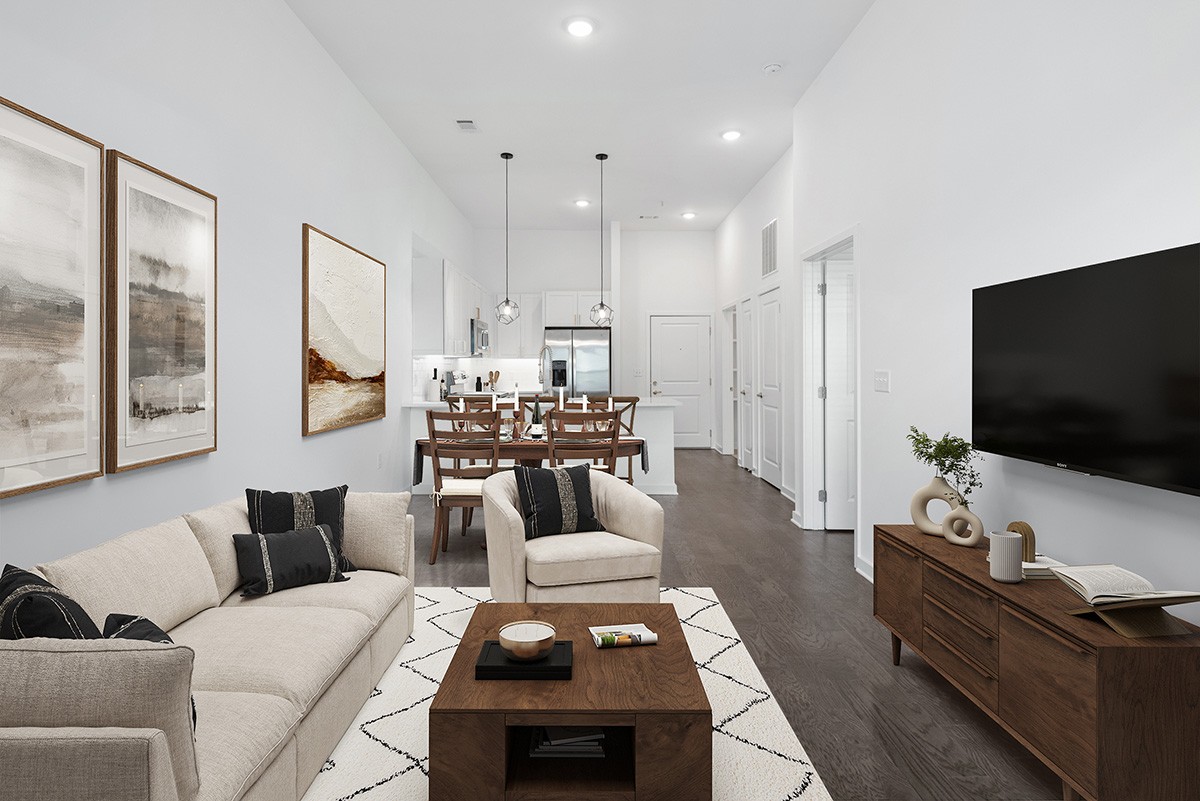 a living room with furniture and a flat screen tv