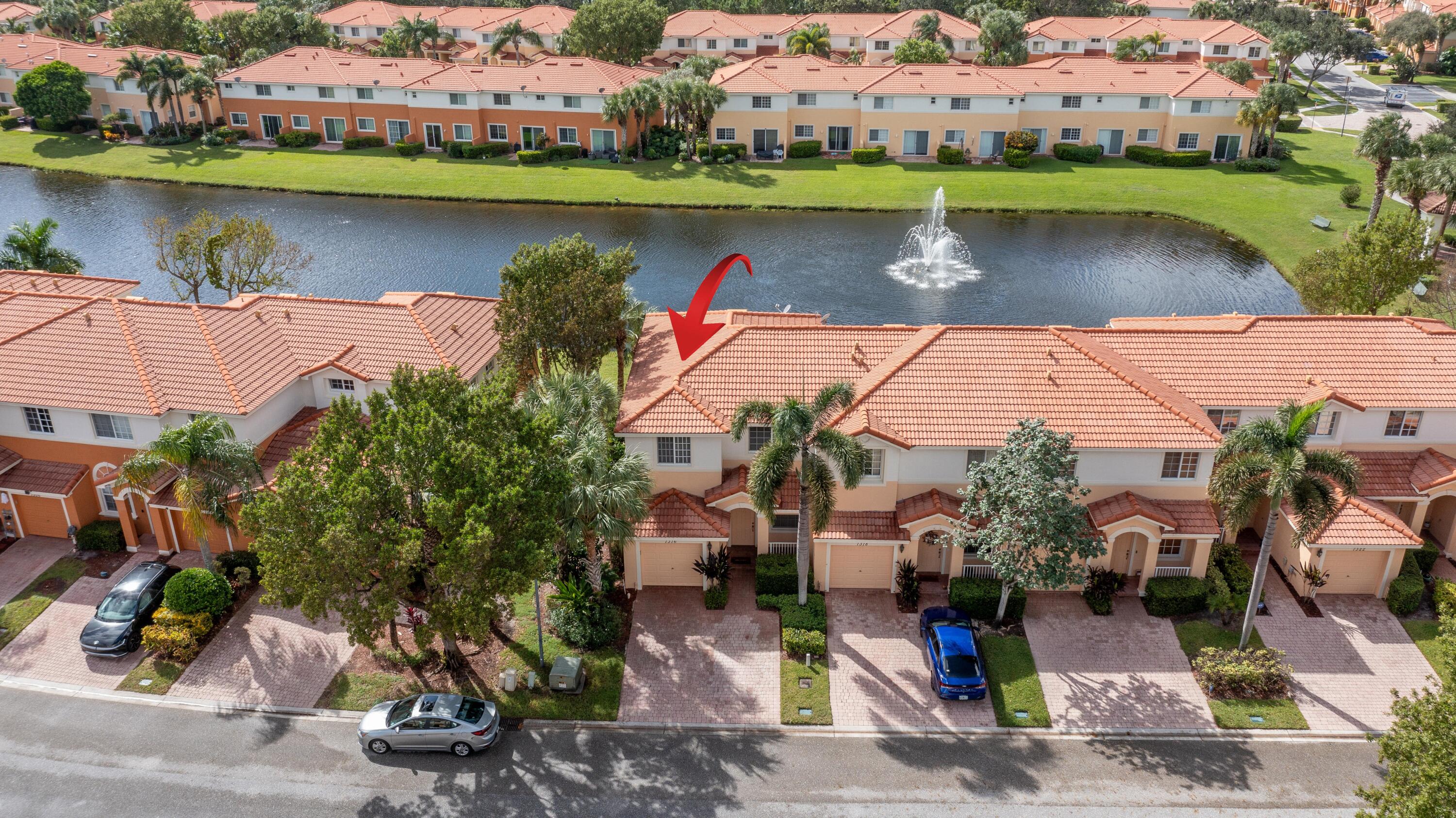 an aerial view of a house with outdoor space