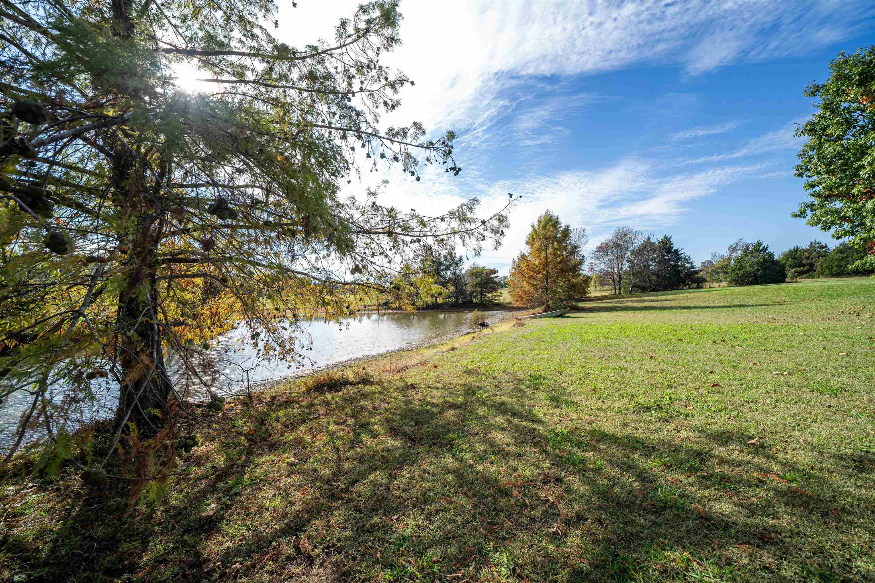 View of yard with a water view