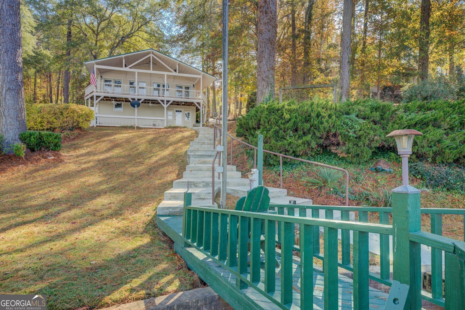 a view of a house with a small yard