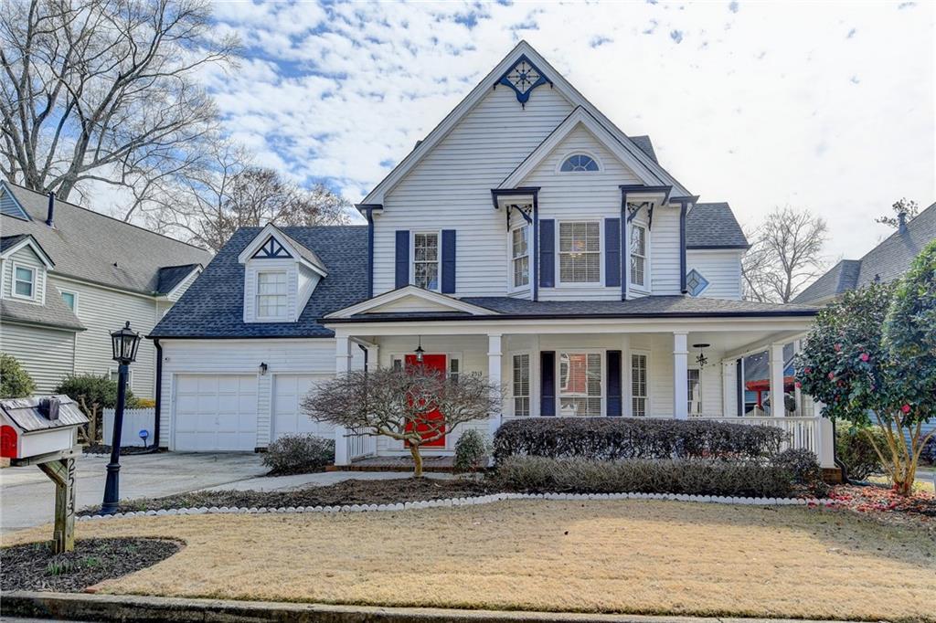 Adorable curb appeal with wrap around porch 