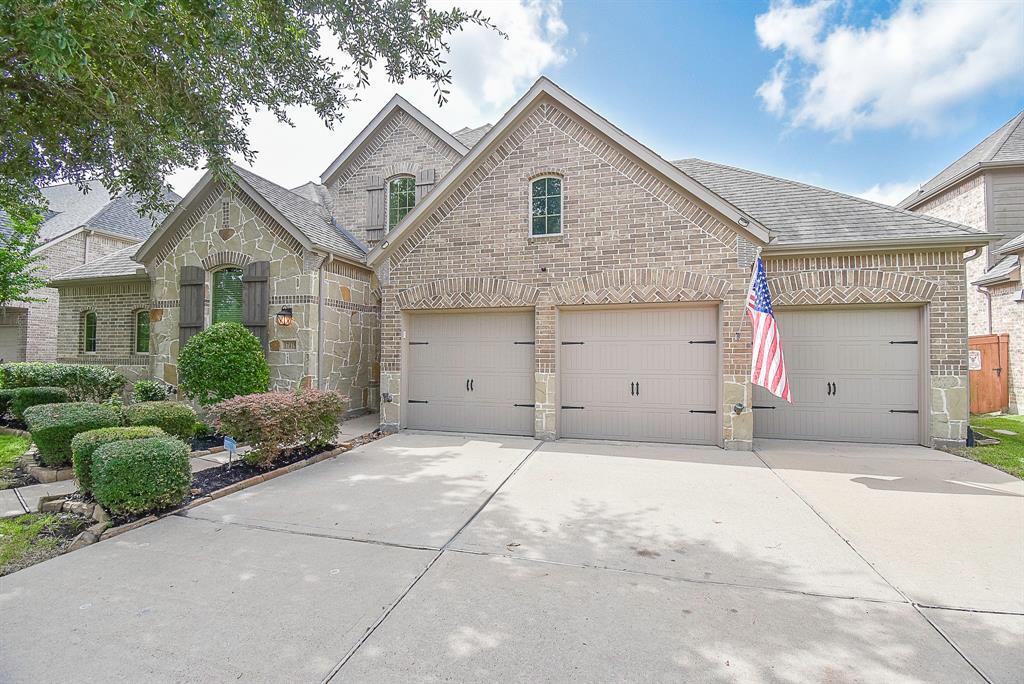 Gorgeous Highland Homes with 4 bedrooms, home office, 4 car garage, covered back patio with outdoor kitchen & swim pool/spa.