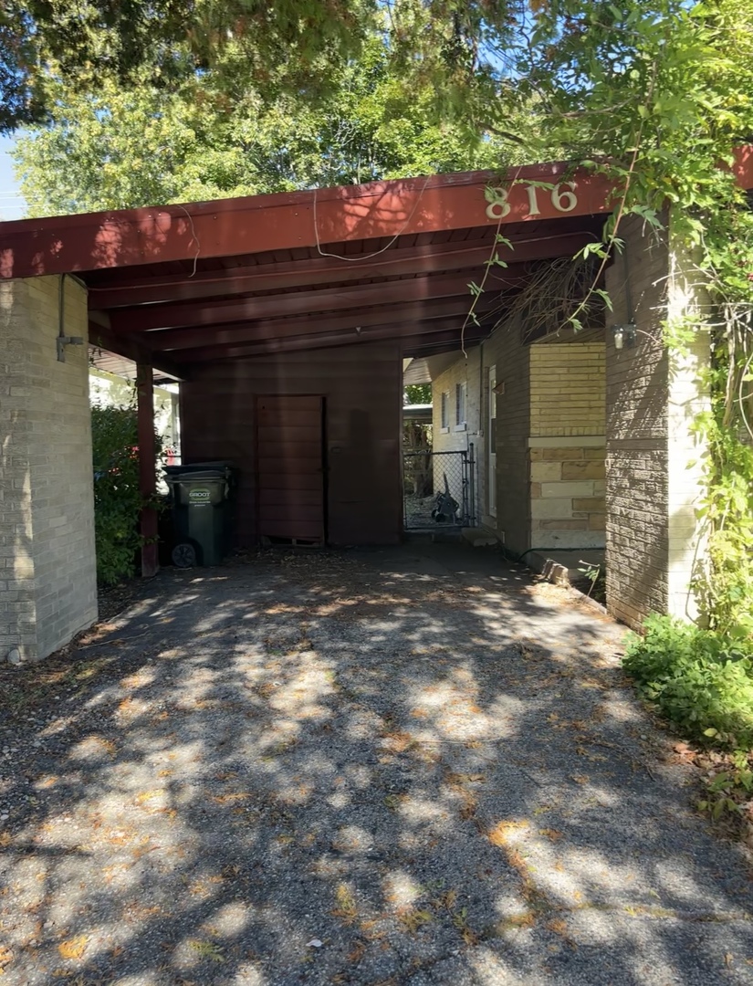 a view of a house with a small yard