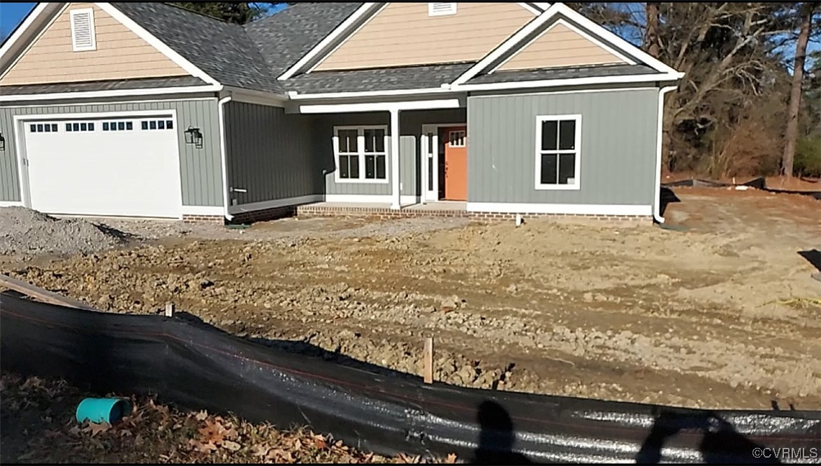 a view of a backyard of the house