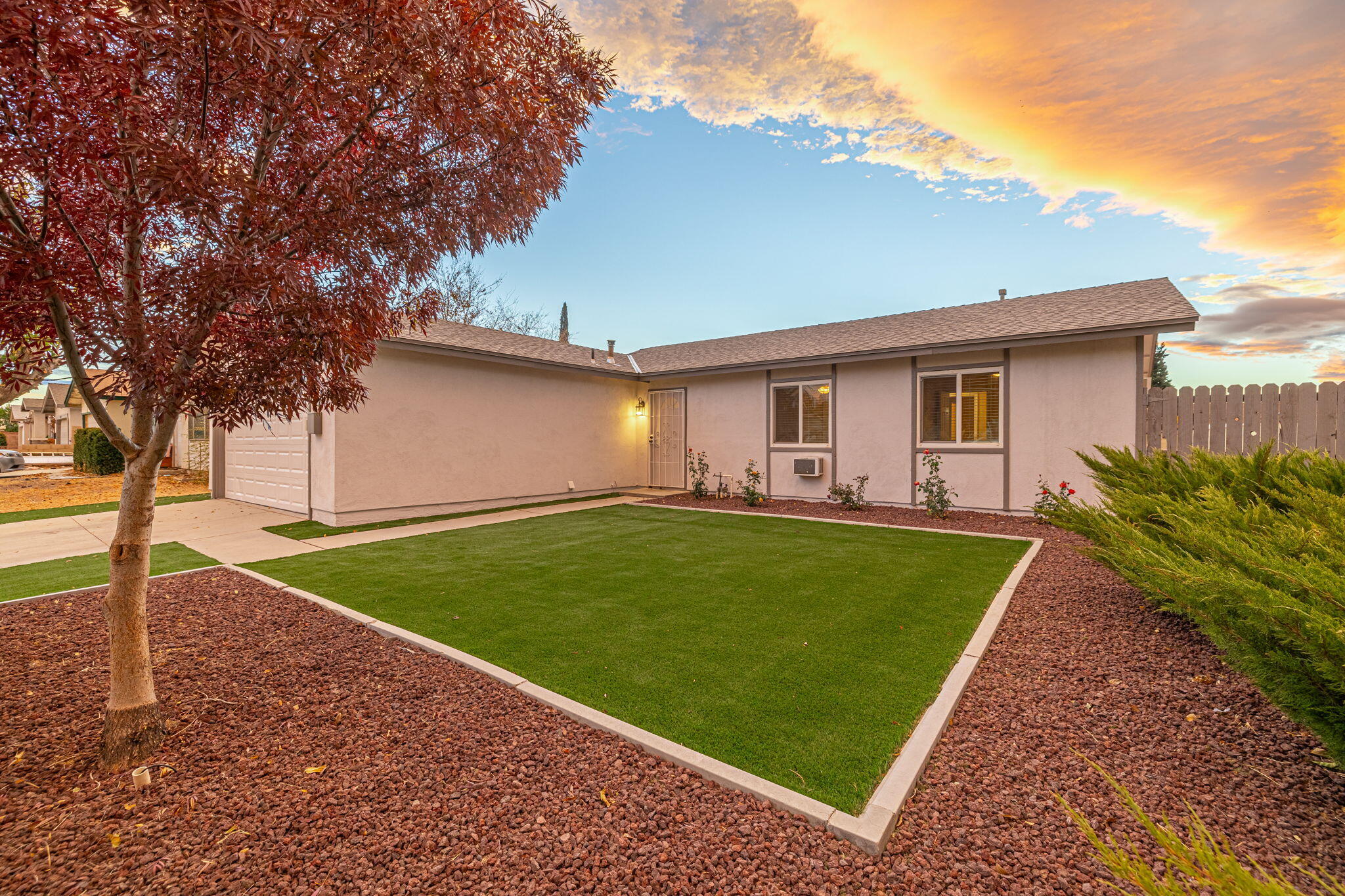 front view of a house with a yard