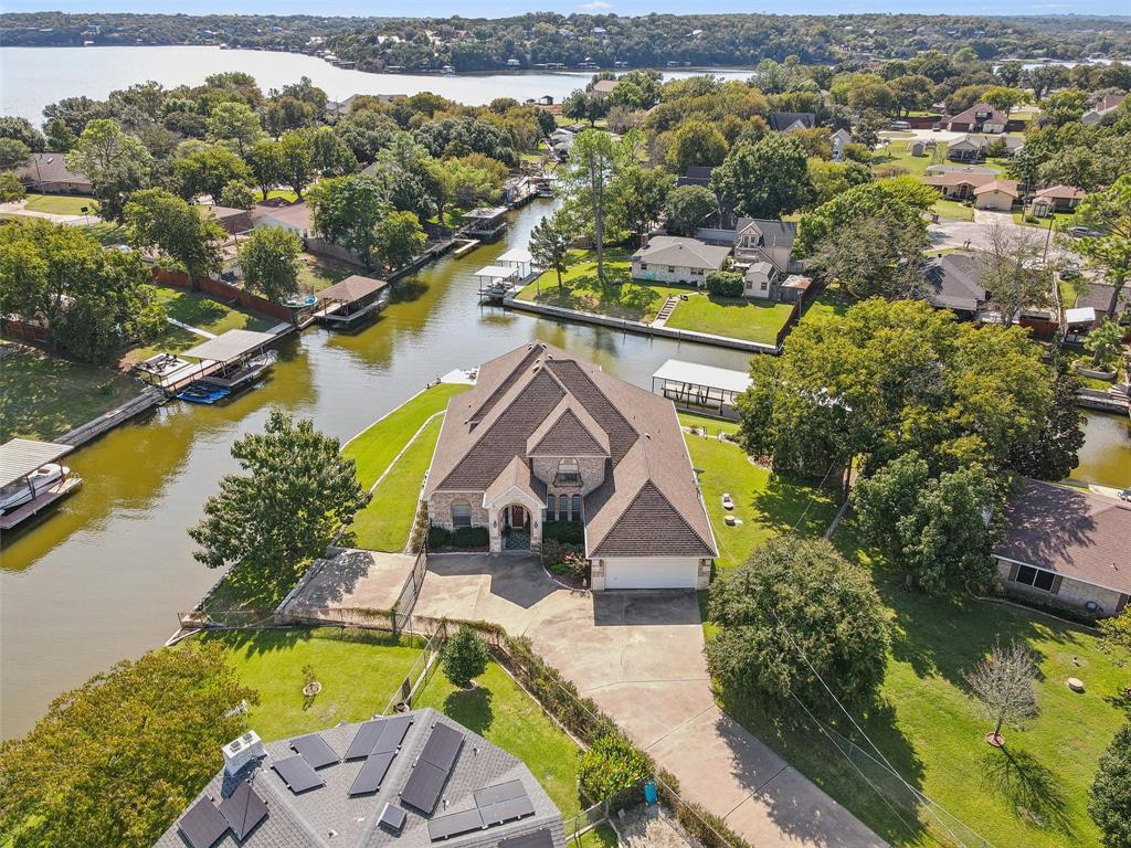 an aerial view of a house with a swimming pool