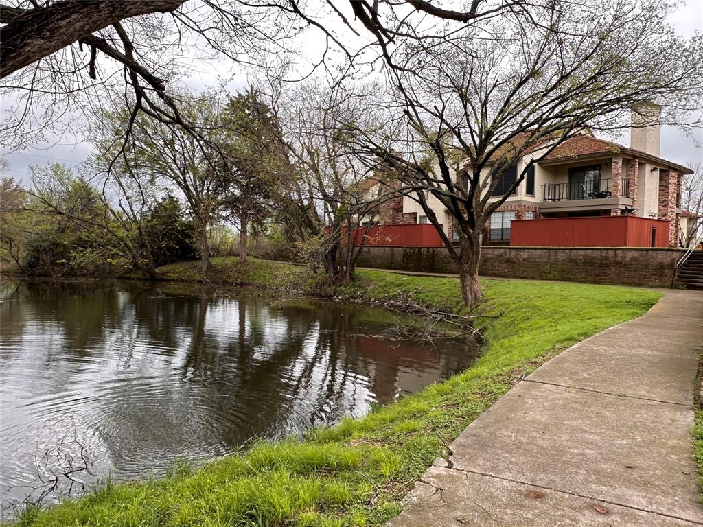 a view of a lake with a house