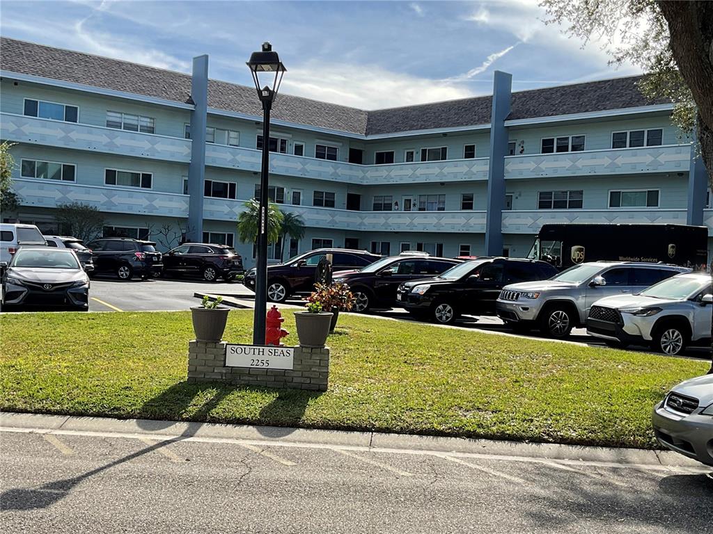 a view of a cars parked in front of a building