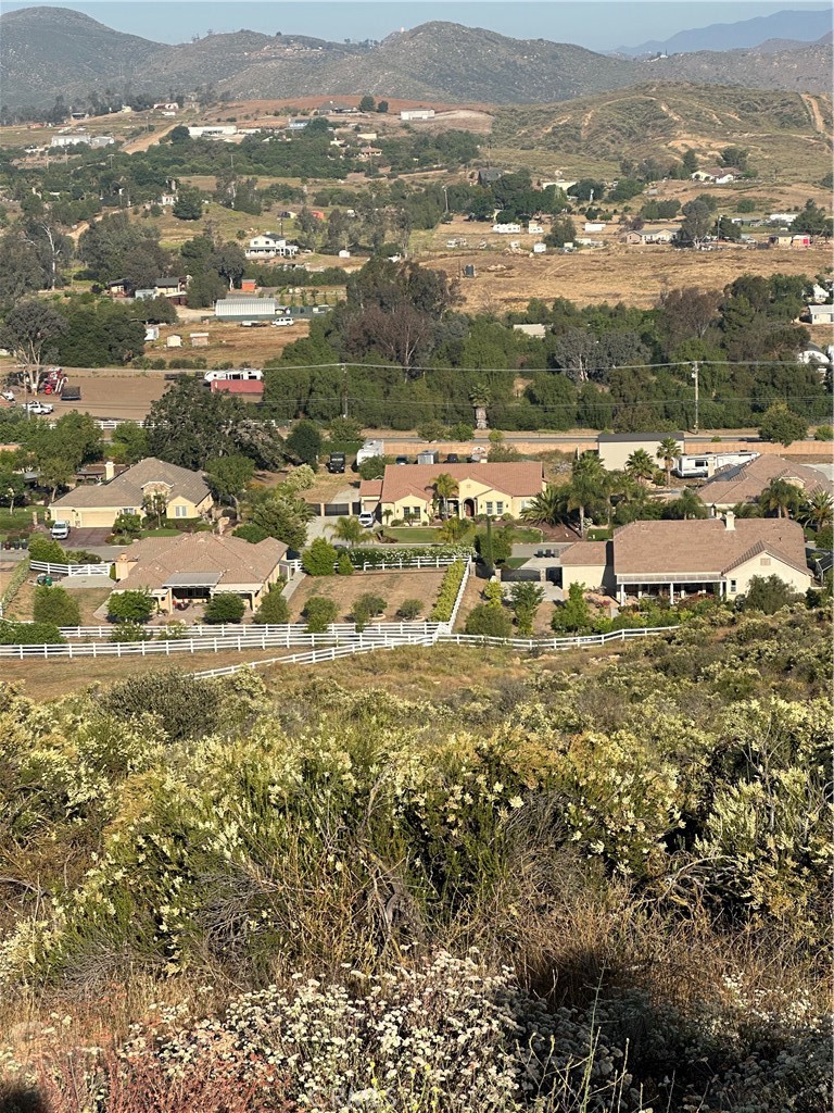 a view of a city with mountains in the background