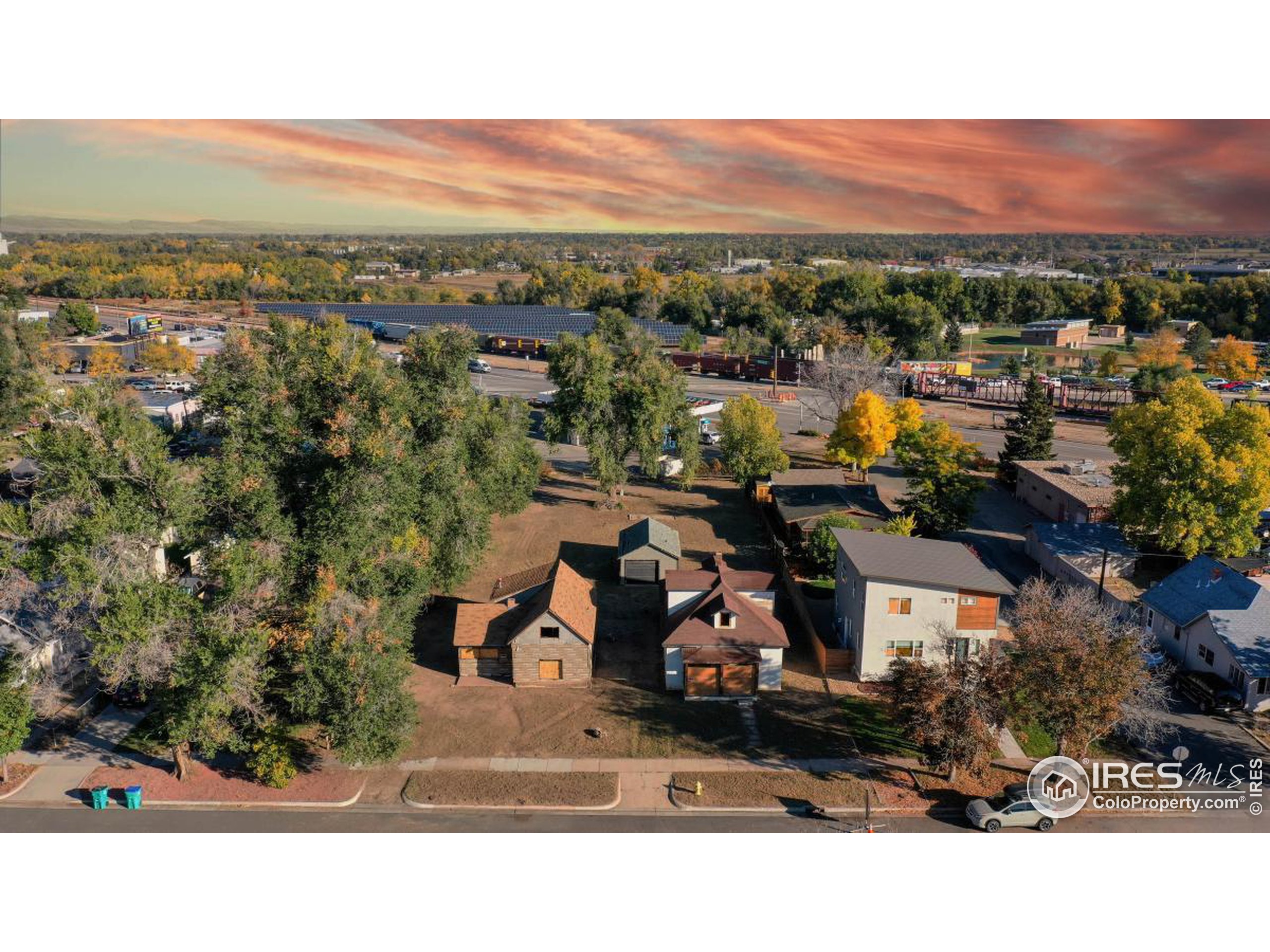 an aerial view of a house with a garden