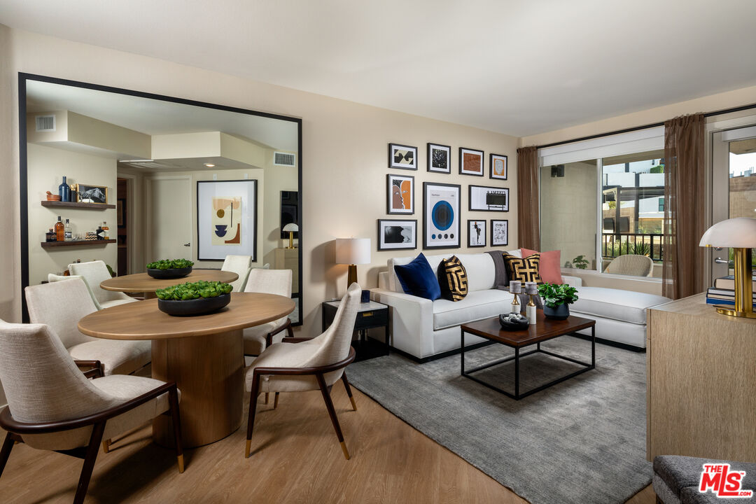 a living room with furniture and a table