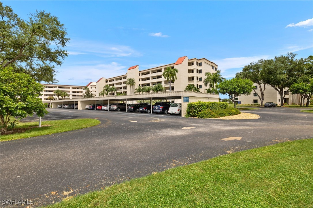 a view of a building with a park