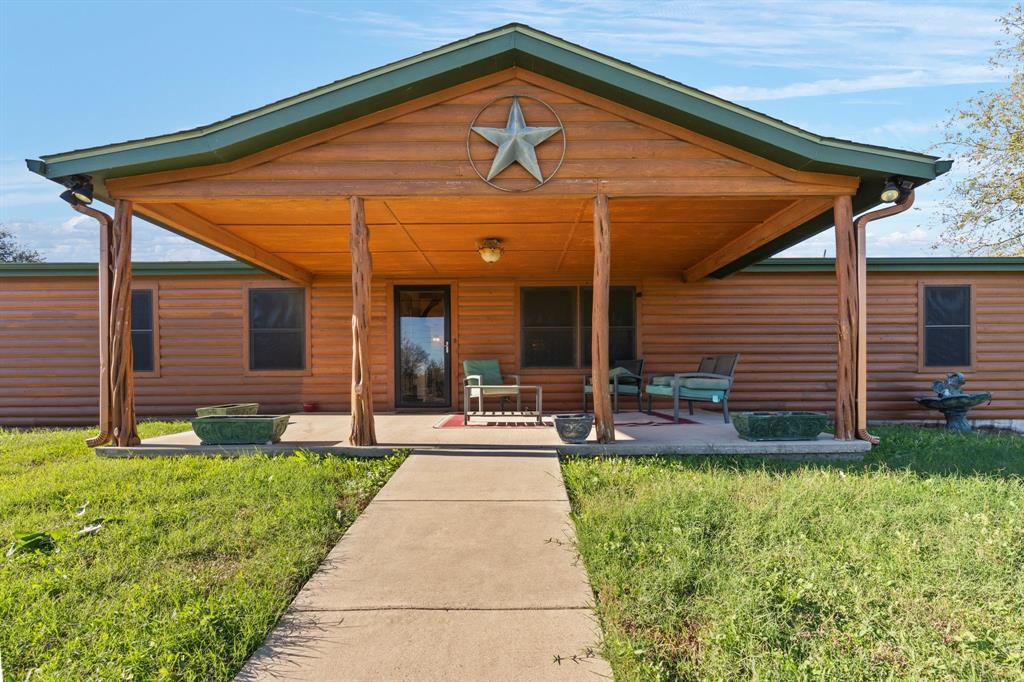 a front view of house with yard