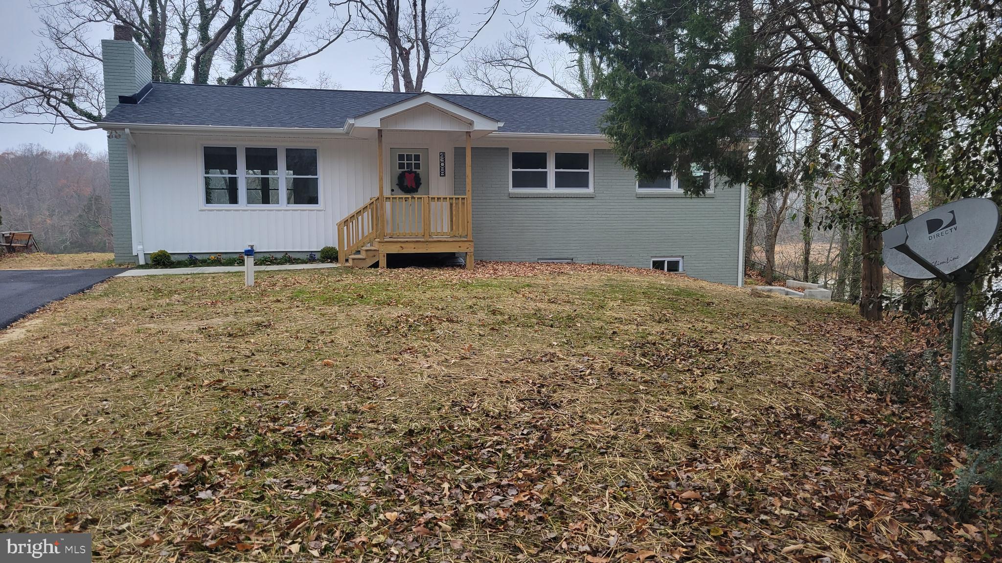 a house with yard in front of it