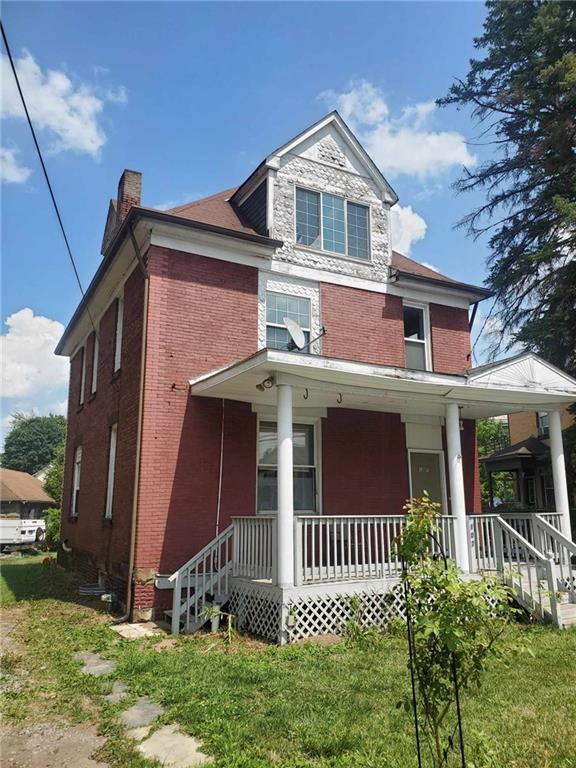 a front view of a house with a porch