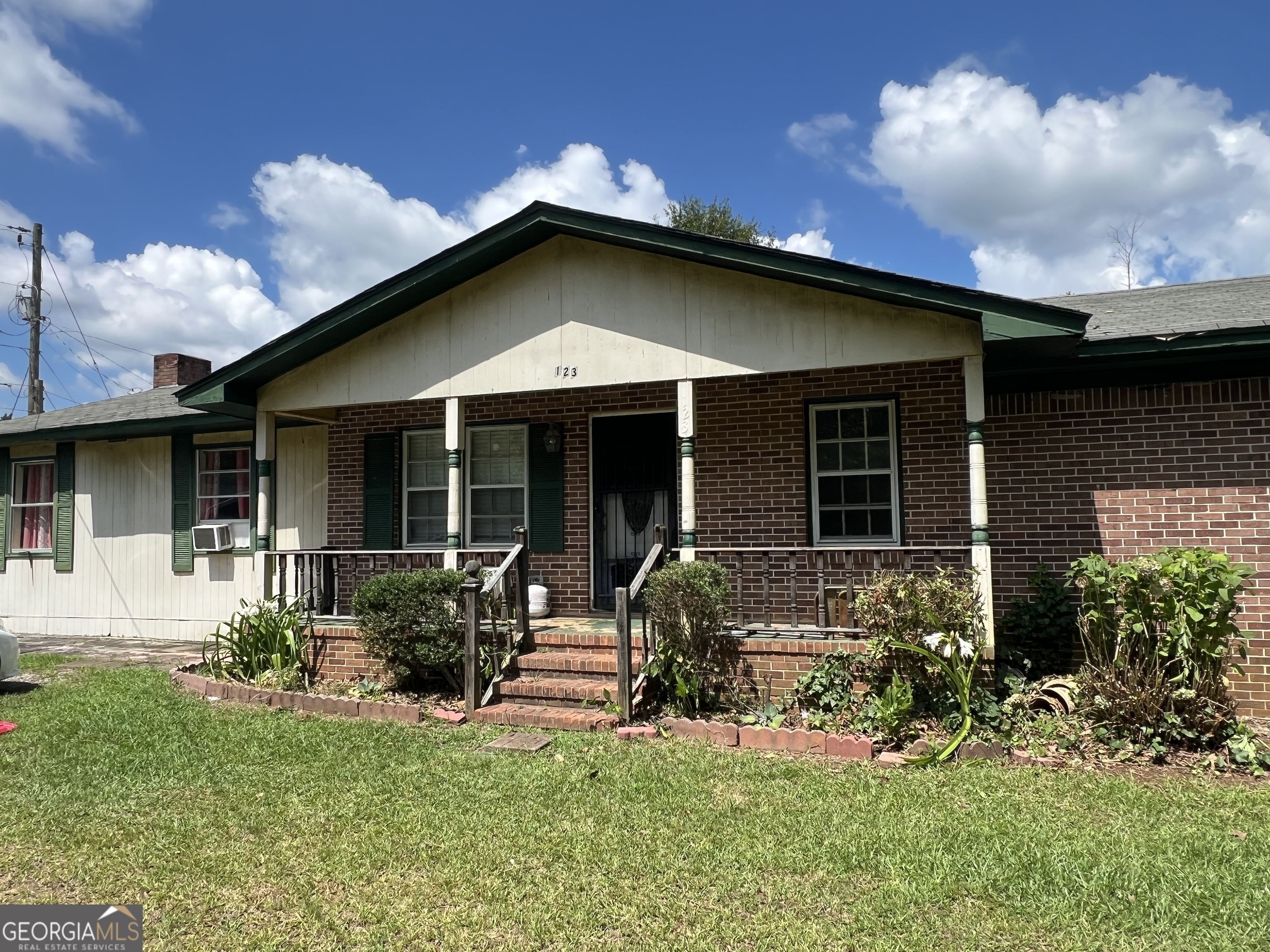 a view of a house with patio