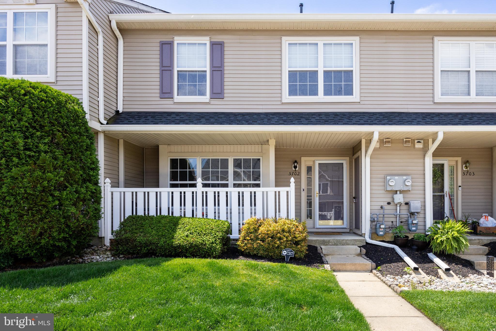 a view of a house with a garden