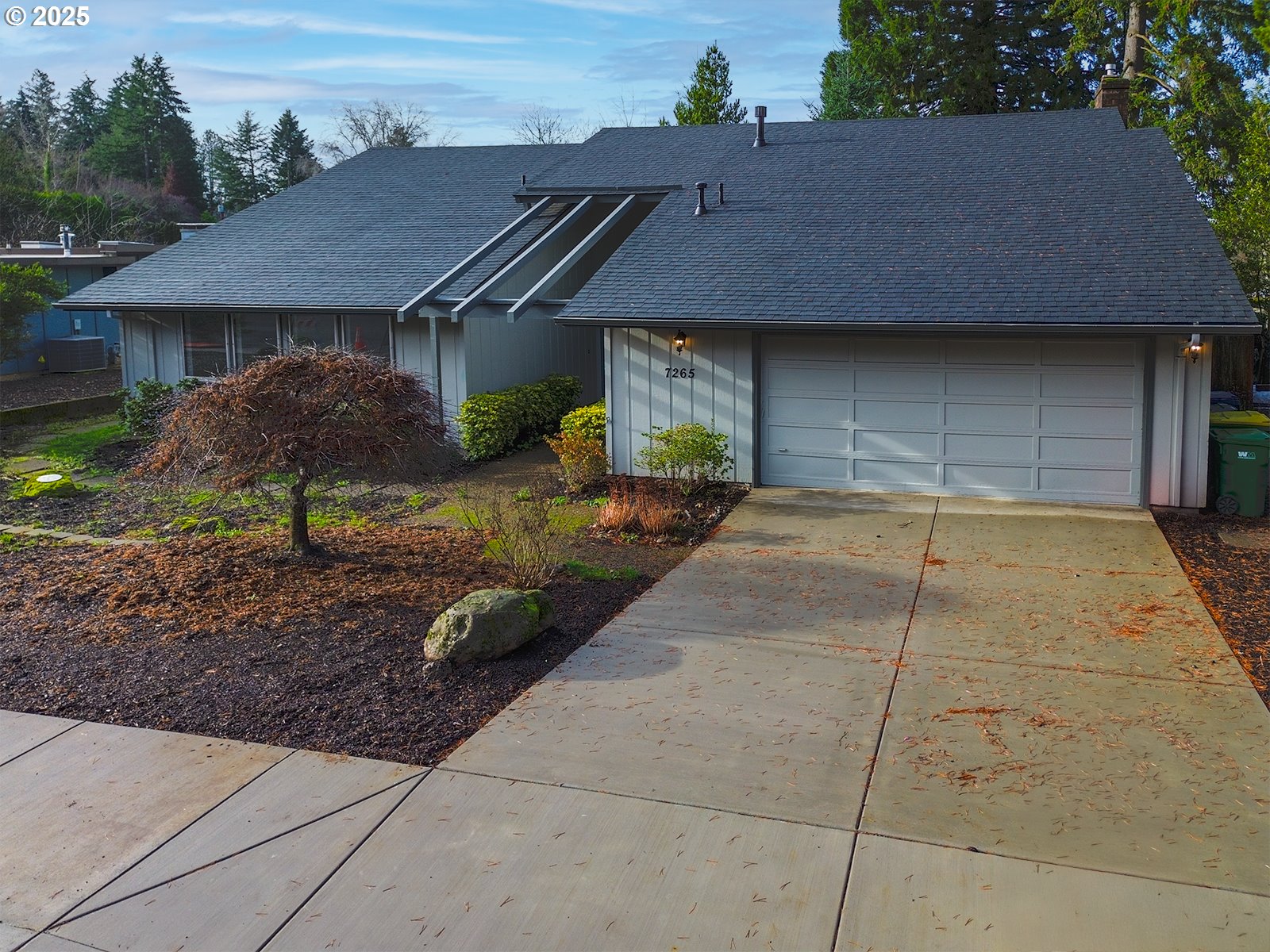 a house view with a garden space