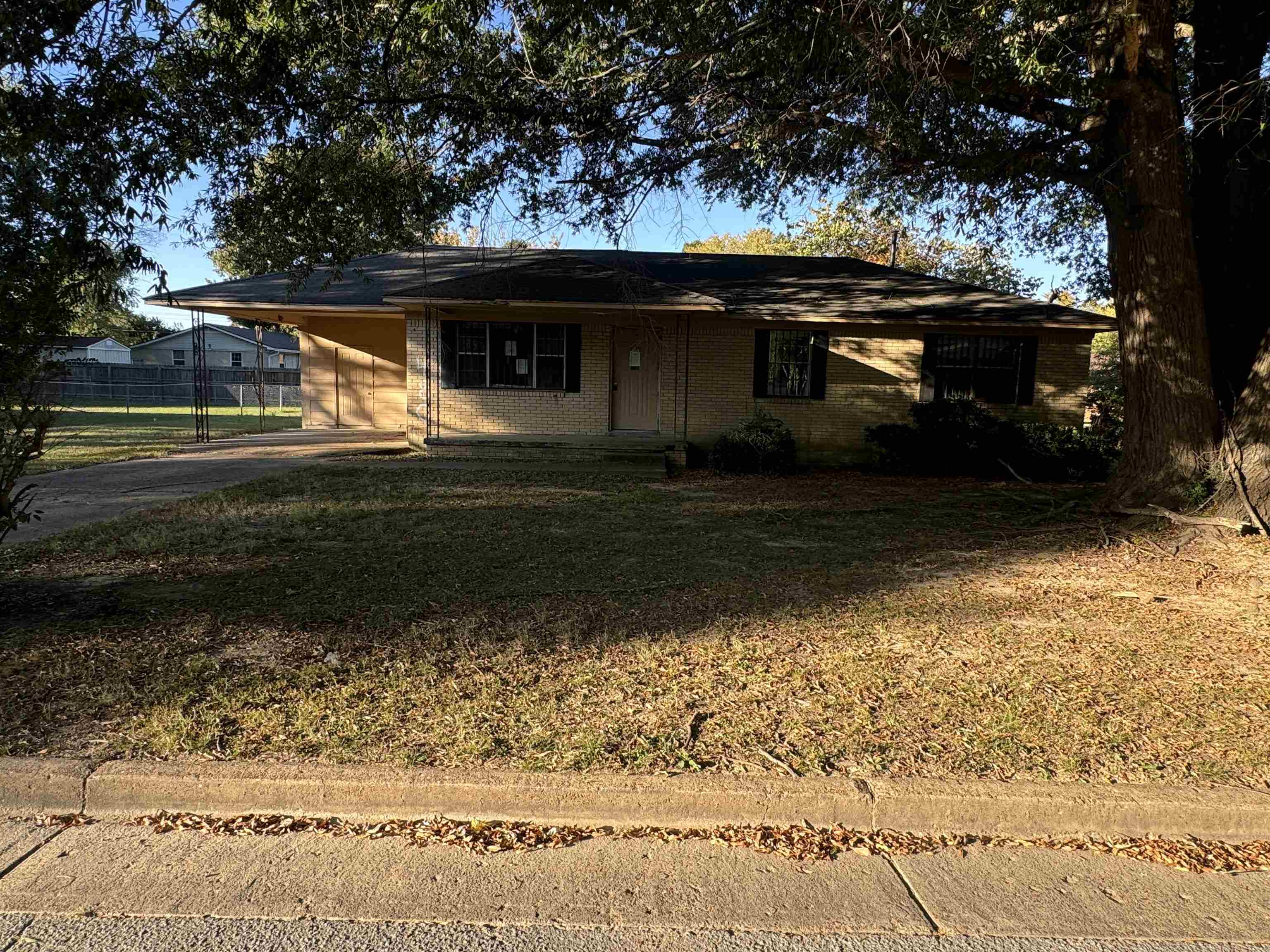 View of front of property with a front lawn