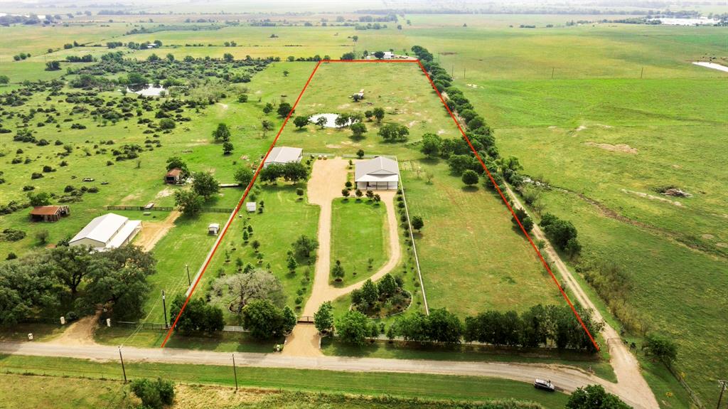 15 acres of land with a barndominium and finished event space/garages