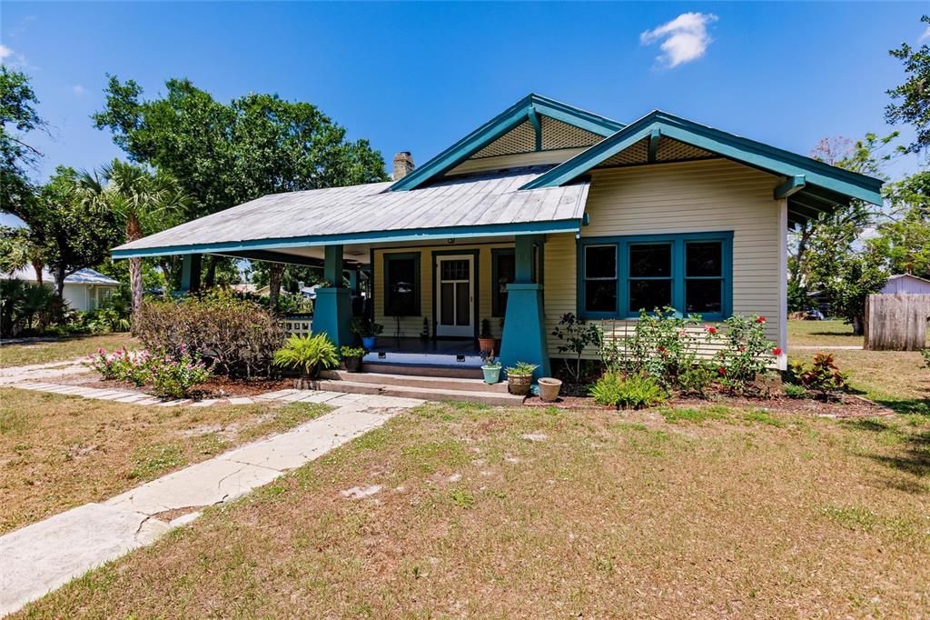 a front view of a house with a porch