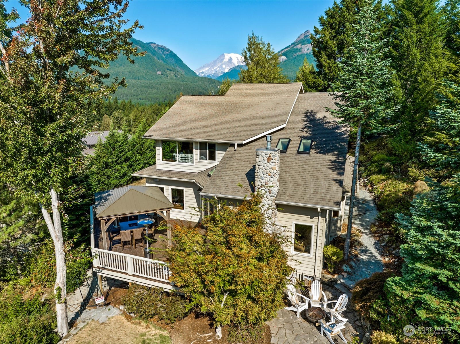 aerial view of a house with a yard