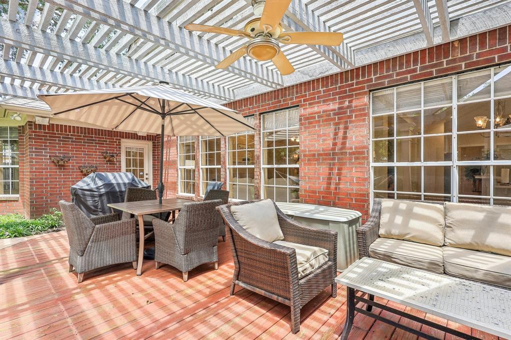 a view of a patio with couches and potted plants