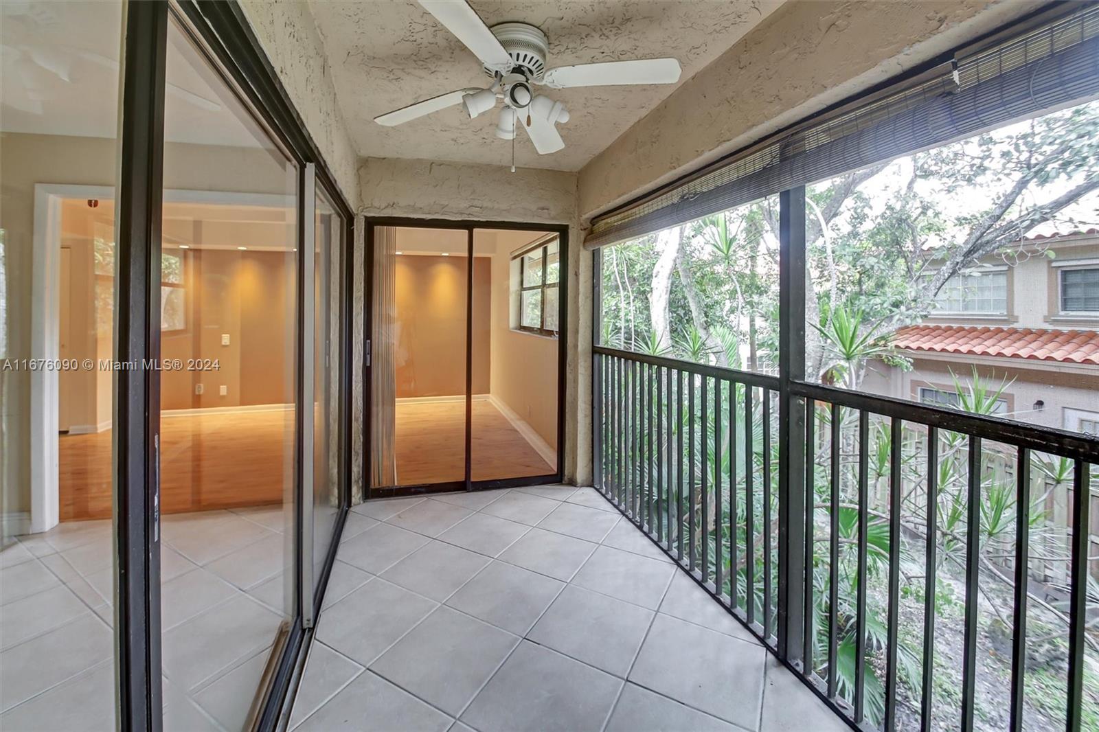 a view of a hallway with windows