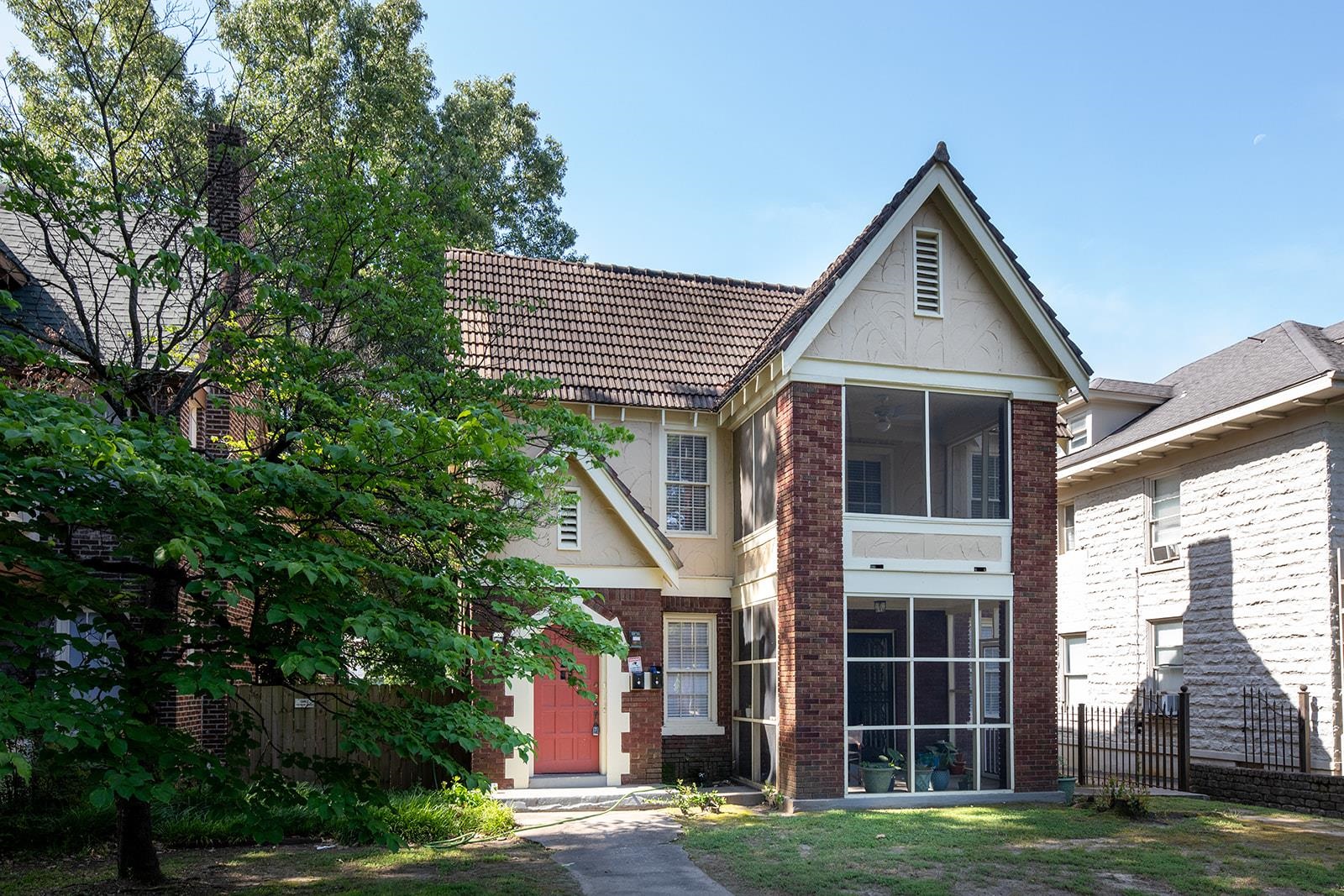 front view of a house with a yard