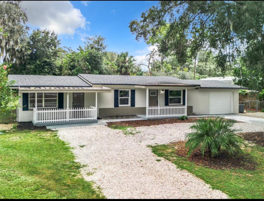 front view of a house that has a yard