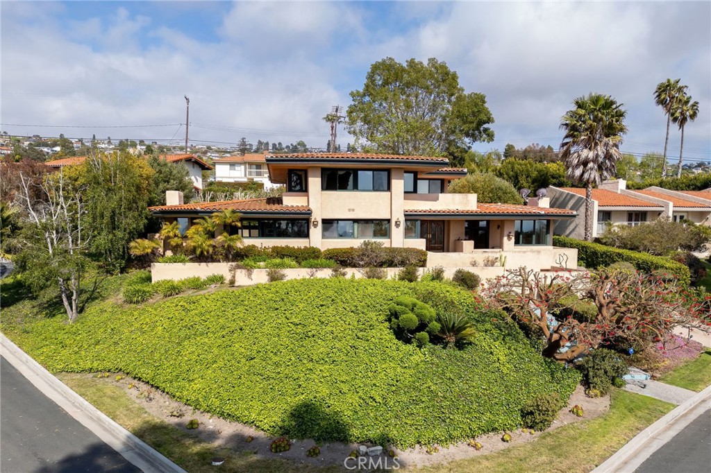 a view of a house with swimming pool