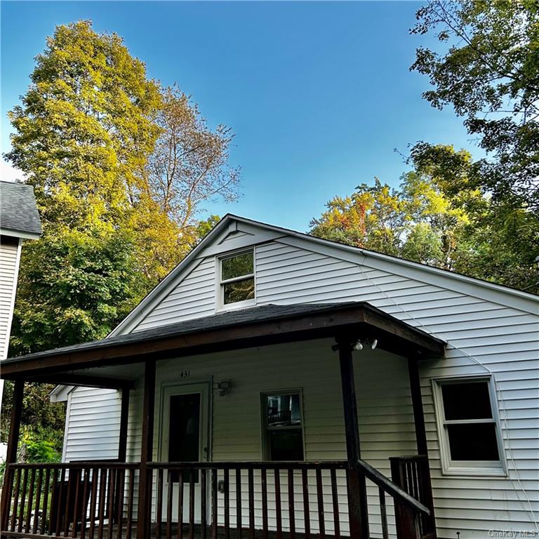 View of front of home with covered porch