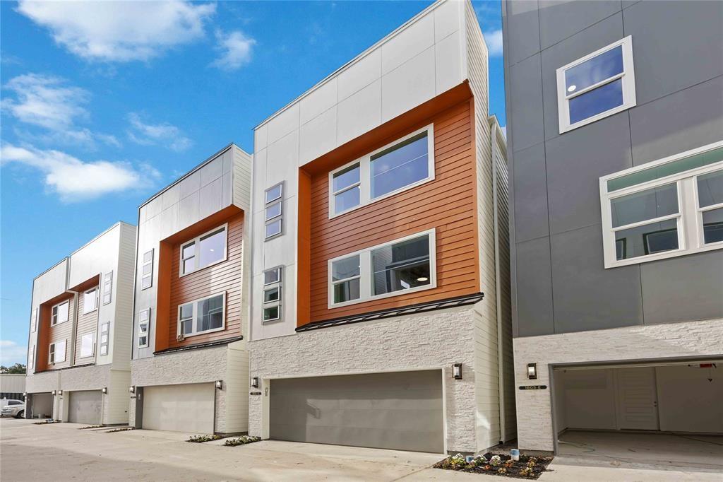 a front view of a building with a lot of windows