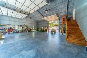 a view of a studio with wooden floor